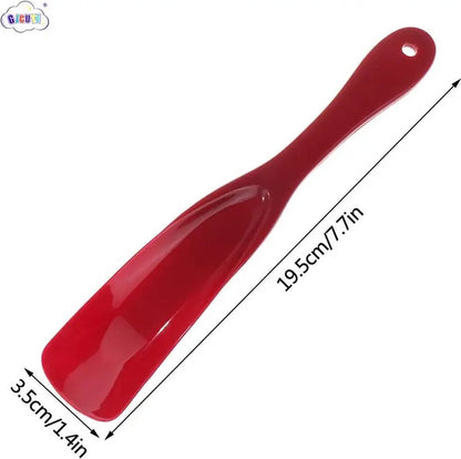 Spoon-shaped shoehorn | Plastic | Length 19.5 cm | Shoe puller | With hanging loop | Black